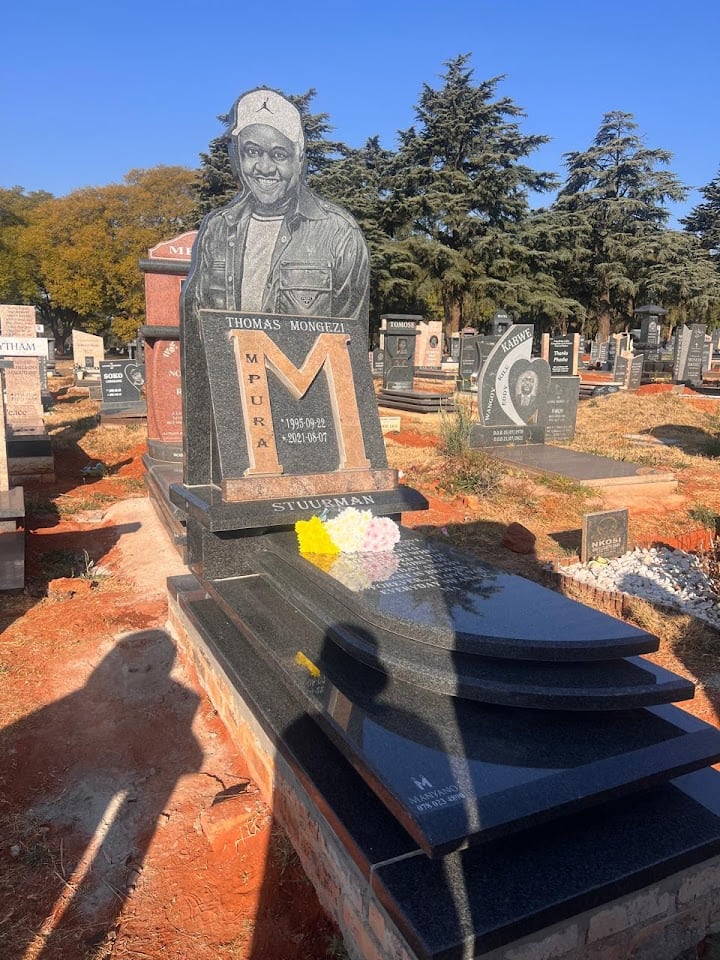 Mpura's new tombstone.